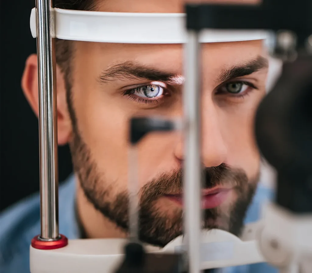 man with retinal disease getting an exam