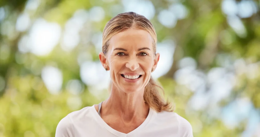 Happy, mature and calm person doing outdoor exercise